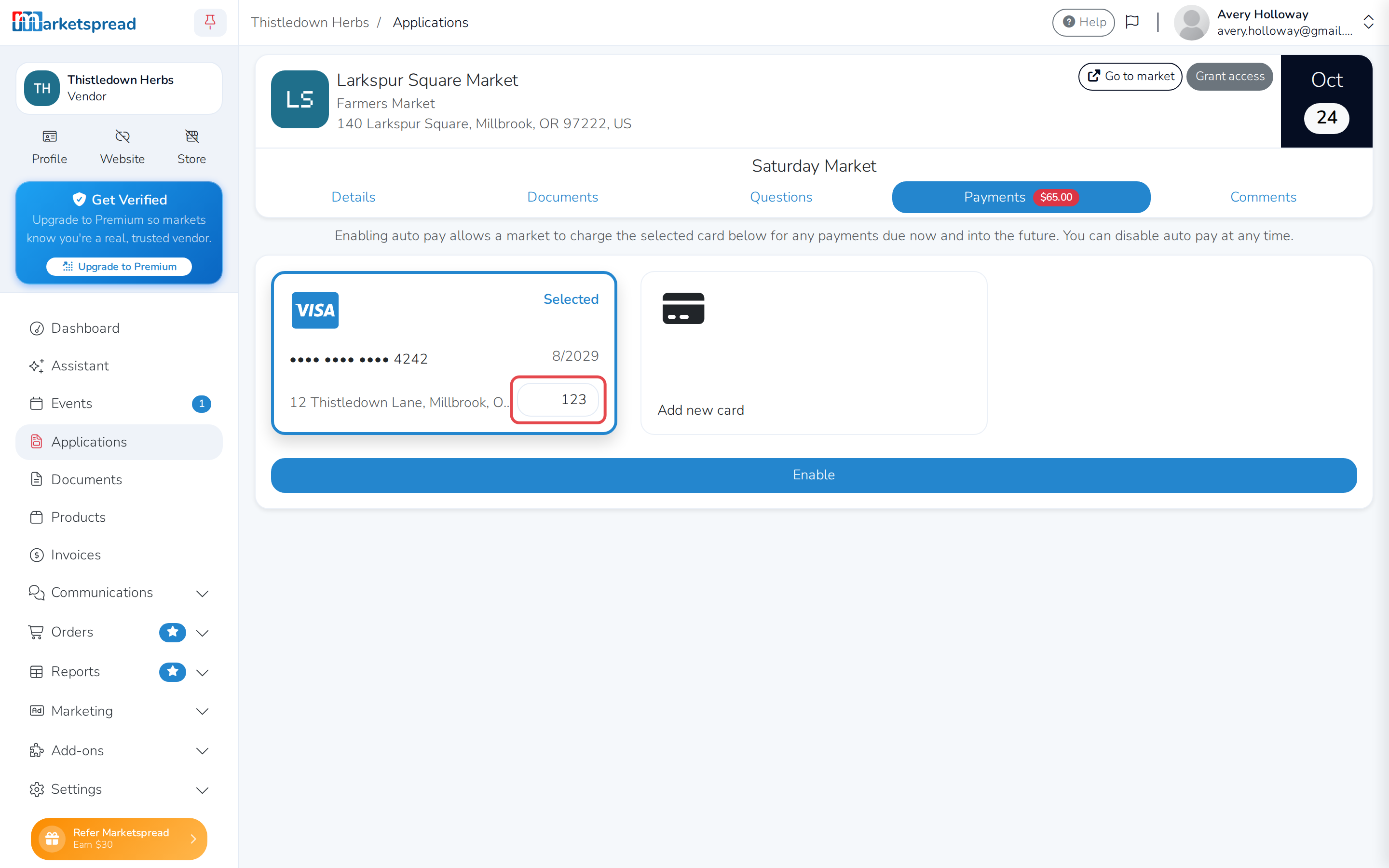 The saved card selected, with its CVV field and the Enable button